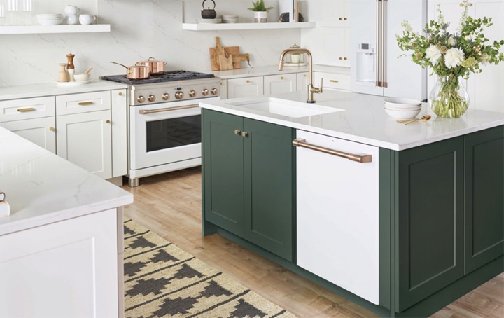 White kitchen with green accents island