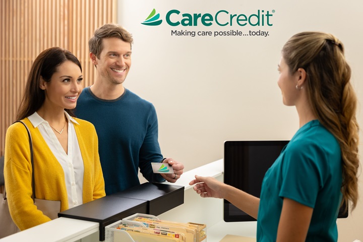 CareCredit — couple and receptionist