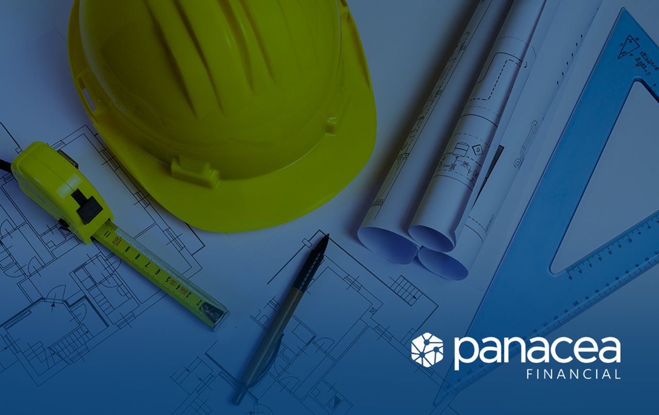 Hard hat, measuring tape, blue prints - Panacea