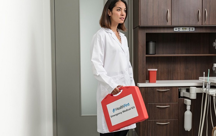 MemberAdvantage HealthFirst Emergency Medical Kit carried by female dentist